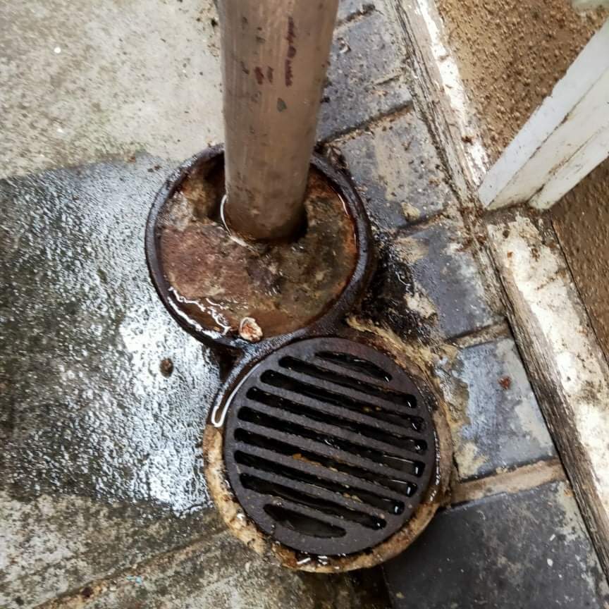 blocked drain with pooling muddy water harkaway